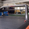 Крышка рольставни с черной дугой ROLLER LID на Toyota Hilux Revo (2015-2023)